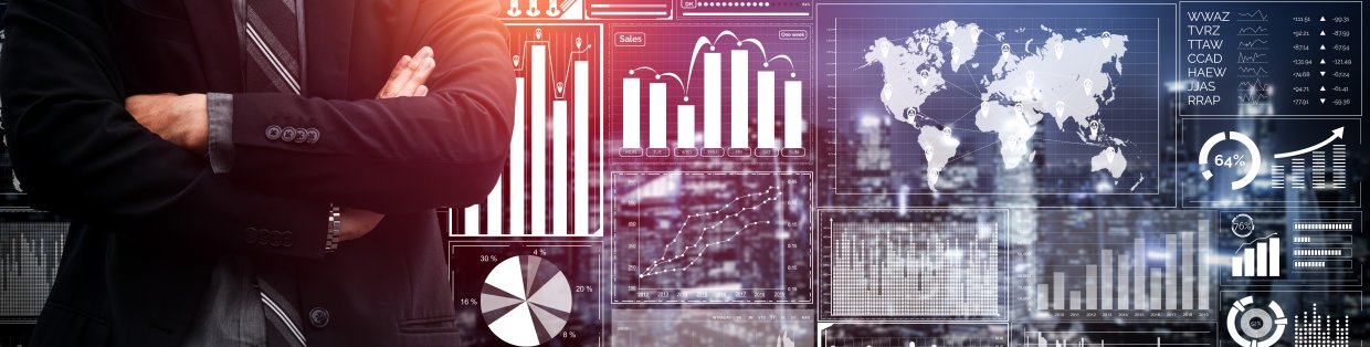 business analytics board with person in front in a suit with crossed arms.