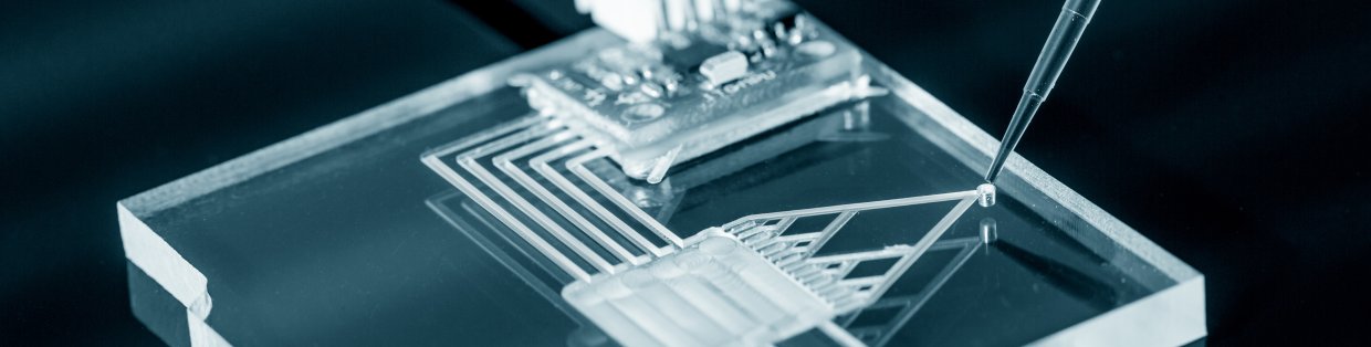 A close up shot of a tweezer placing an object on a data board. 