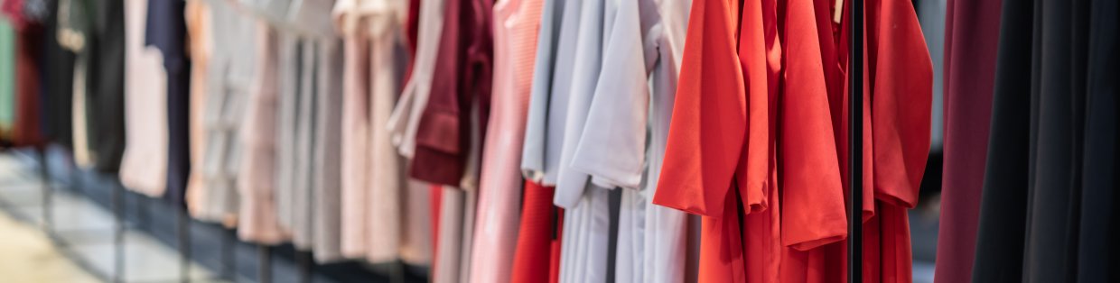 a rack of clothing in a store.