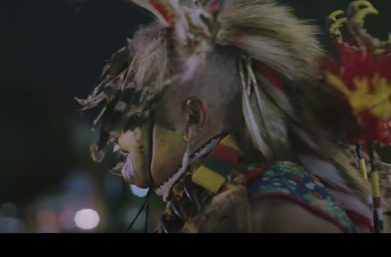 side profile of a native american traditional dancer