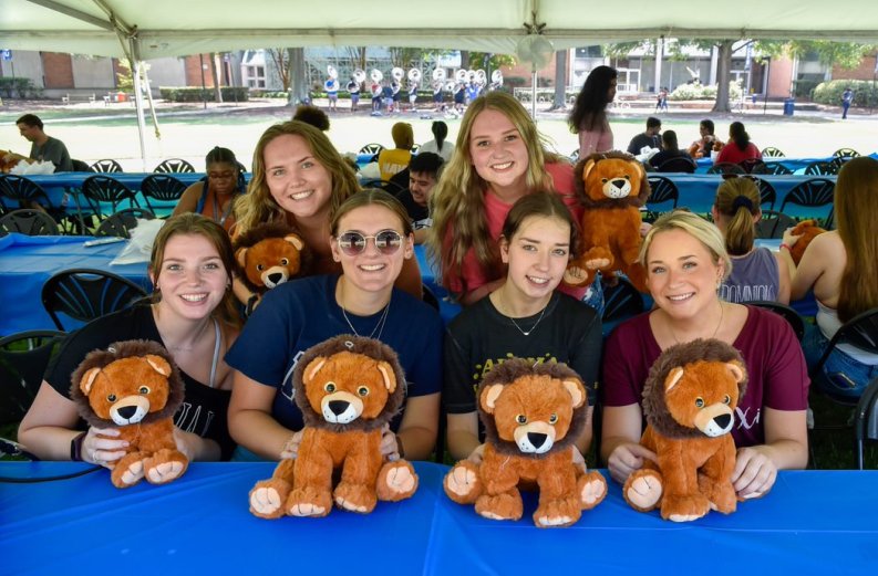 Students with stuffed animals