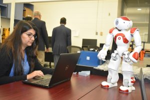 Mechanical and Aerospace Engineering Student with Robot