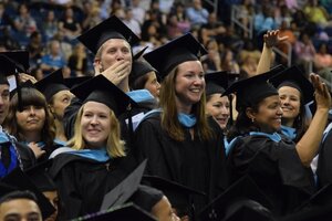 graduates at commencement