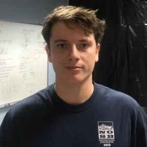 portrait of a student wearing a navy blue t-shirt