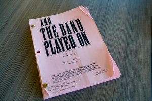 Photo of a film script that reads "And the Band Played On." 