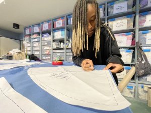 Woman sewing clothes