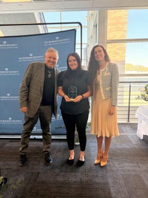 Lauren Robins being given an award