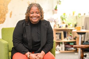 ODU graduate researcher Melissa Miller-Felton sits in a chair. 