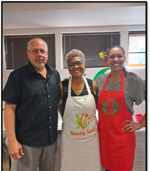 Olivia Newby with her husband and daughter
