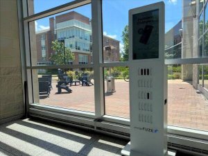 SRC kiosk against window