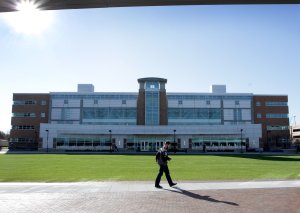 Student Walks by Perry Library