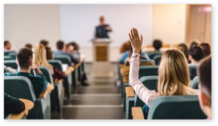 Student raising her hand in ODU class
