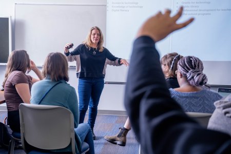 Image of Professor Jennifer Kidd teaching her class in education.