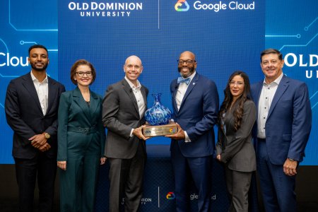 President Brian O. Hemphill, Ph.D., presents a gift to Google representatives.