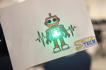 a drawing of a robot with a glowing heart
