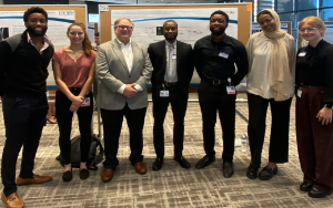 Group shot of Musto and researchers