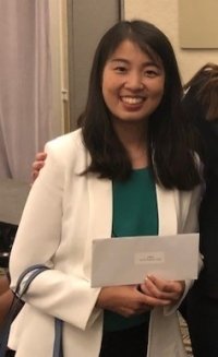 Li receiving her award