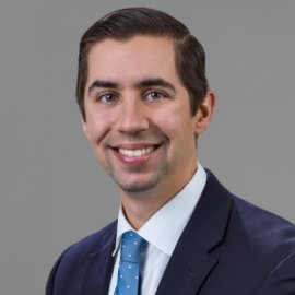 Logan Booth, Audit Partner.