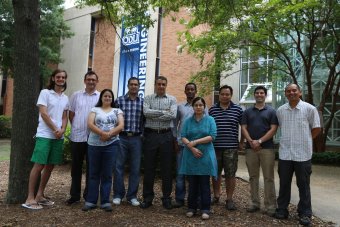 Mecit Cetin, transportation engineer with students.