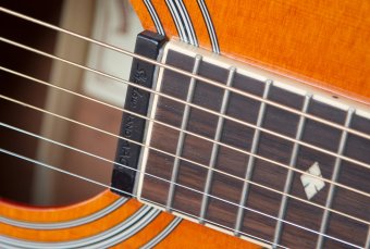 Orange Guitar Neck With Strings