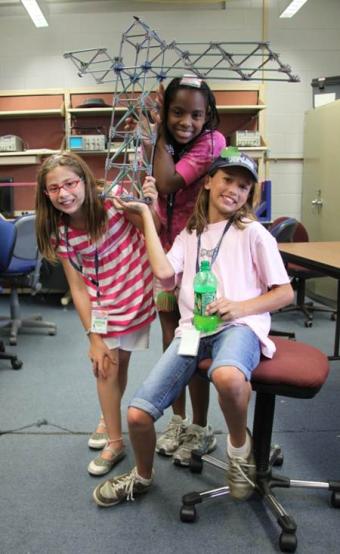 Engineering Summer camp girls with cranes