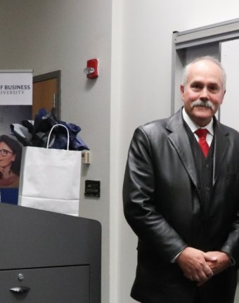 Stan Crater speaks and Dean Jeff Tanner