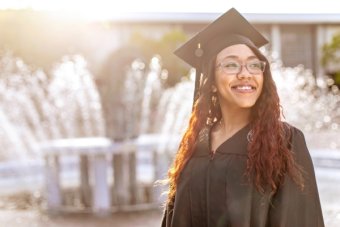Graduate at fountain