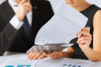 Man signing contract