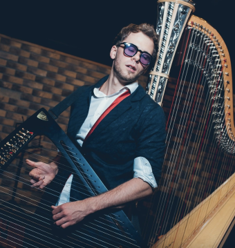 Man playing harp
