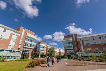 Students walking across the Quad.