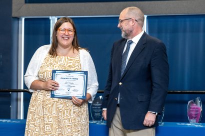 Lil Haber with Provost Payne receiving a certificate.