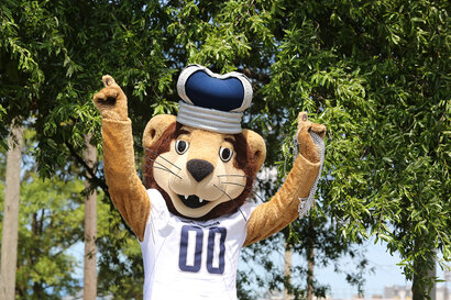 Big Blue mascot welcoming new employees. 